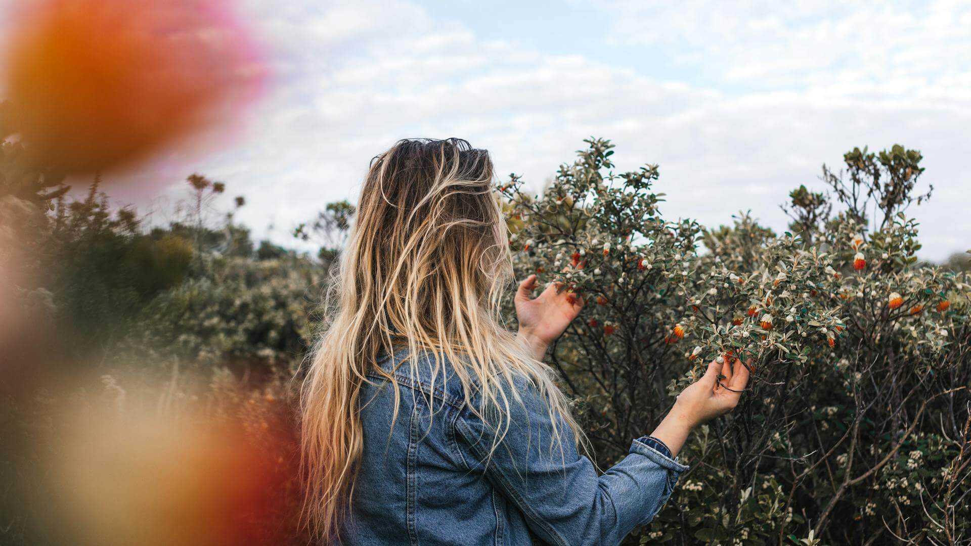 woman getting energy from the outdoors