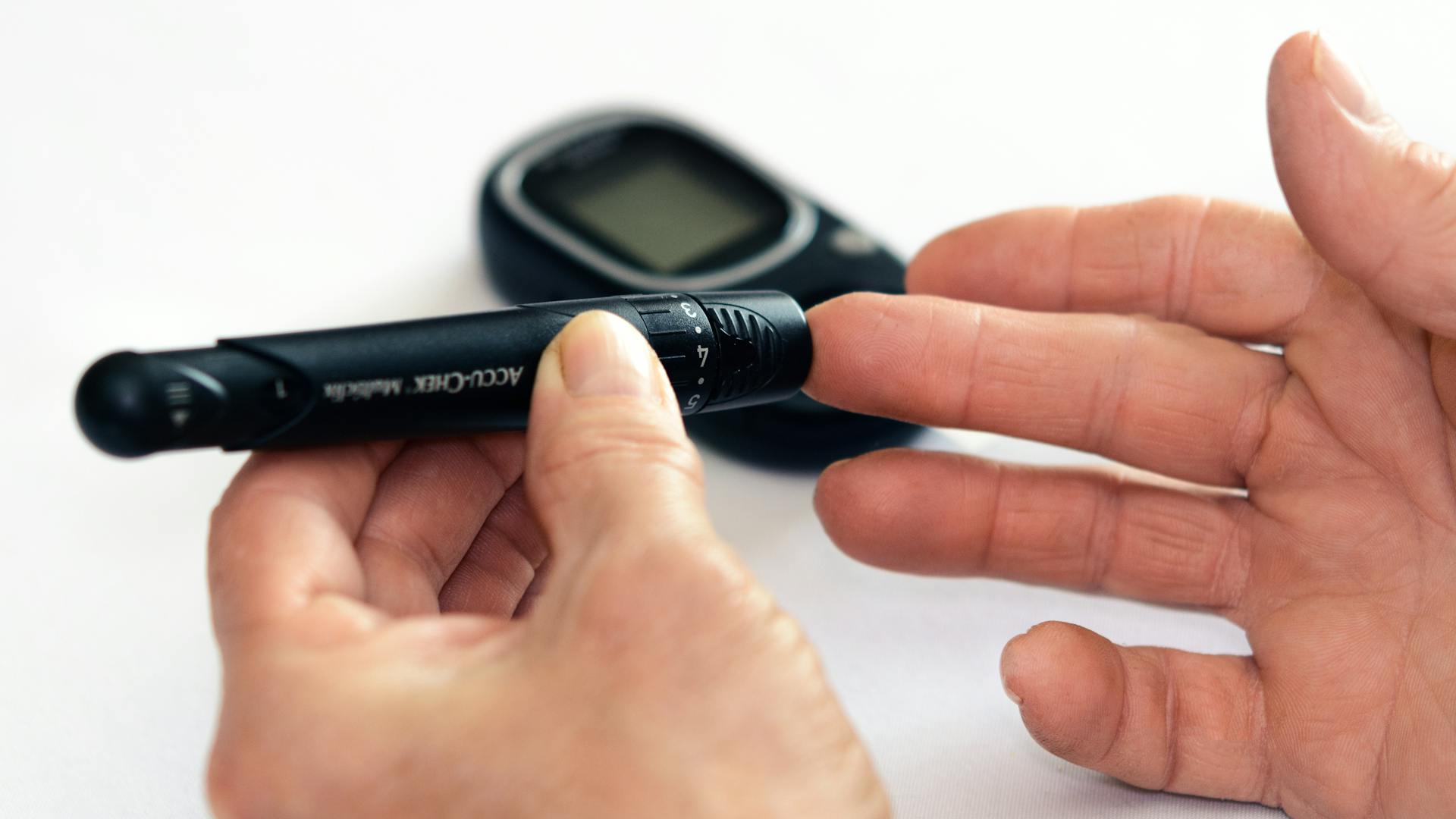 person checking their blood pressure